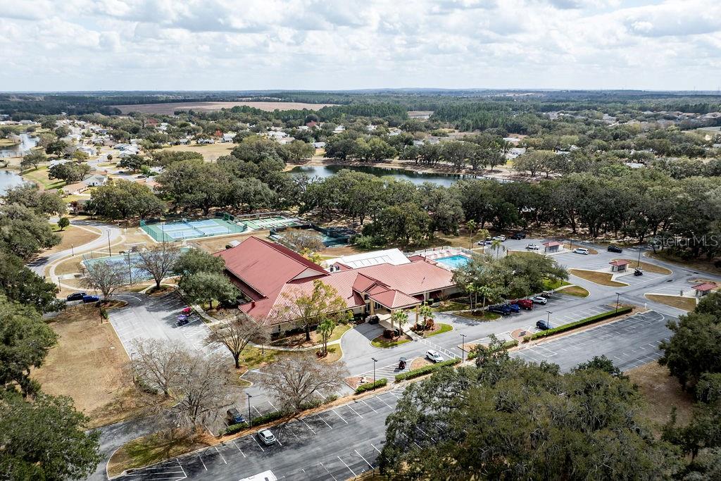 6555 Wilander Street Leesburg, FL 34748 - Photo 39 of 45 an aerial view of residential houses with outdoor space
