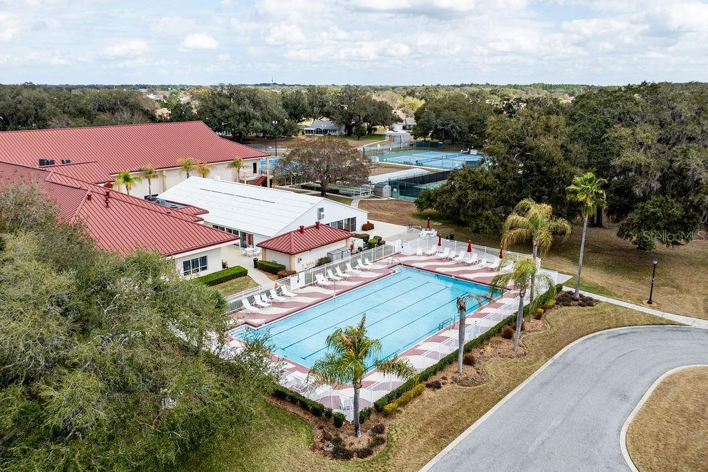 6555 Wilander Street Leesburg, FL 34748 - Photo 40 of 45 an aerial view of a house with a garden
