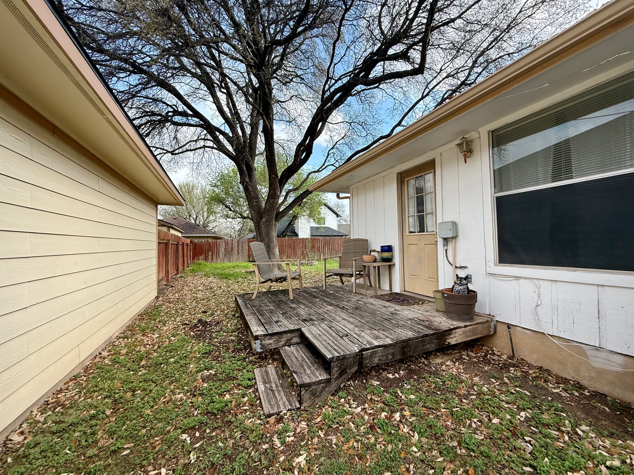 16704 Whitebrush Loop Austin, TX 78717 - Photo 16 of 20 a backyard of a house with table and chairs