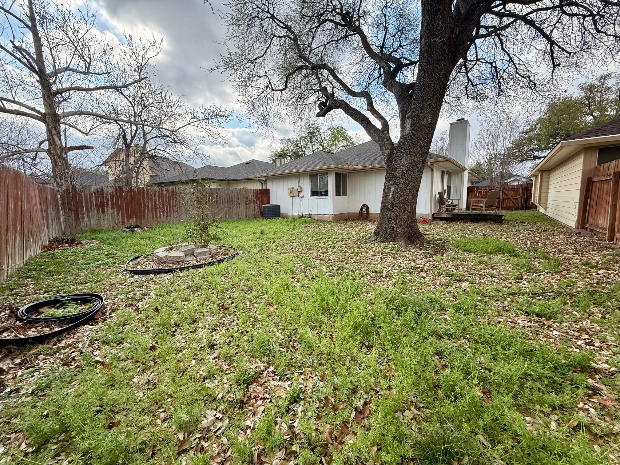 16704 Whitebrush Loop Austin, TX 78717 - Photo 20 of 20 a view of a house with a yard