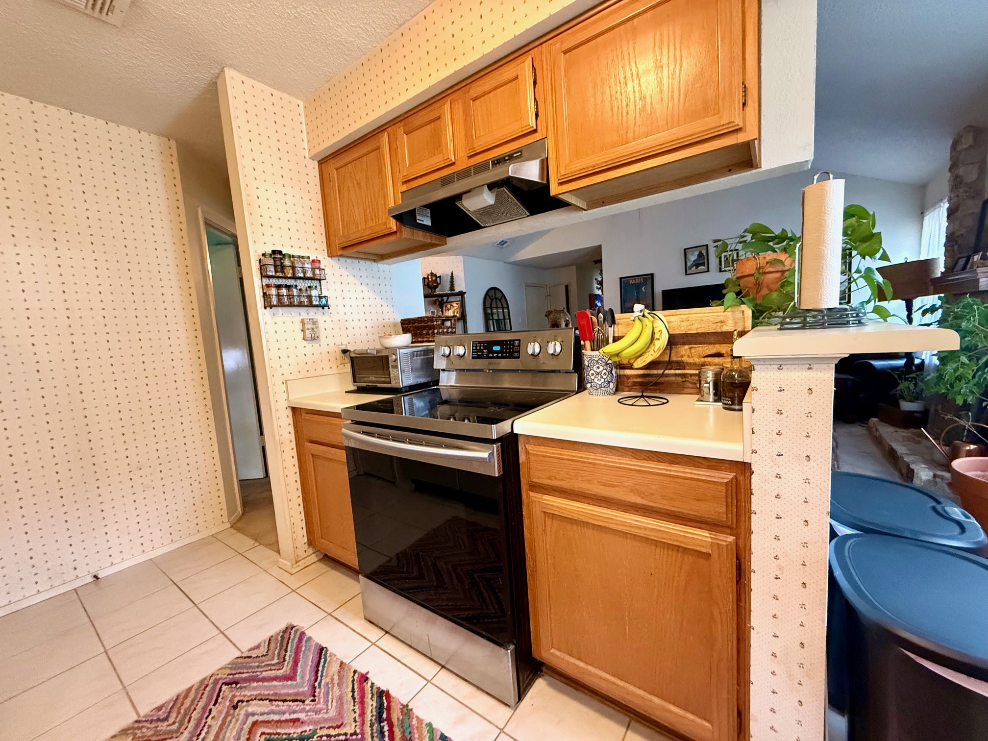 16704 Whitebrush Loop Austin, TX 78717 - Photo 8 of 20 a kitchen with stainless steel appliances granite countertop a stove a sink and a refrigerator