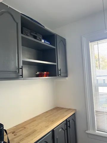 a room with storage and utility