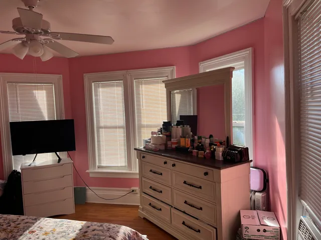 a room with furniture and flat screen tv