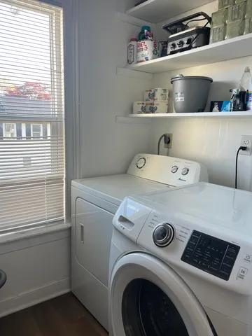 a utility room with dryer and washer