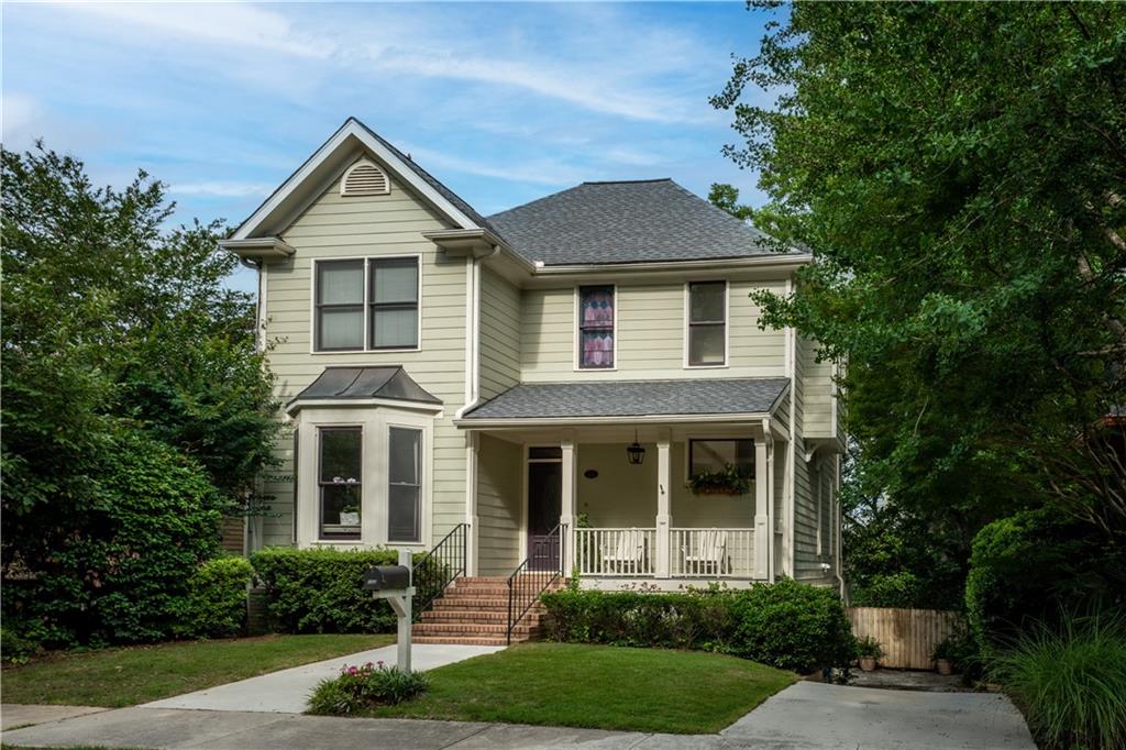 122 Barry Street Decatur, GA 30030 - Photo 1 of 1 front view of a house with a yard