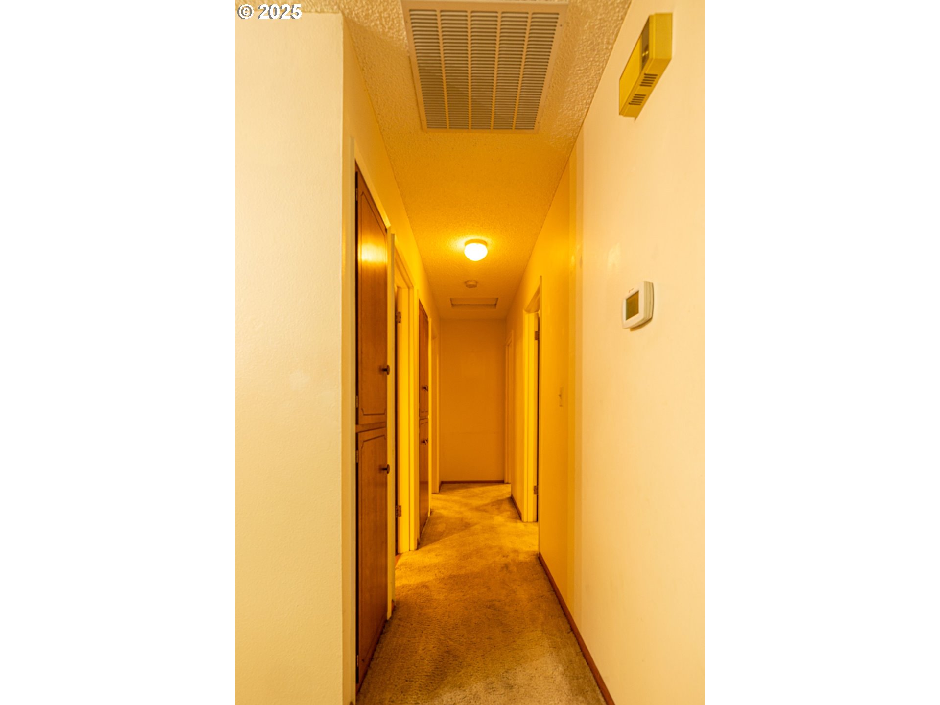 2796 Terry Avenue Longview, WA 98632 - Photo 18 of 19 a view of a bathroom with a shower curtain