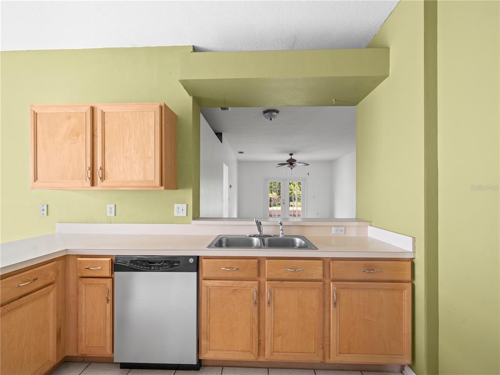 30638 Nickerson Loop Wesley Chapel, FL 33543 - Photo 11 of 39 a bathroom with a granite countertop sink and a mirror