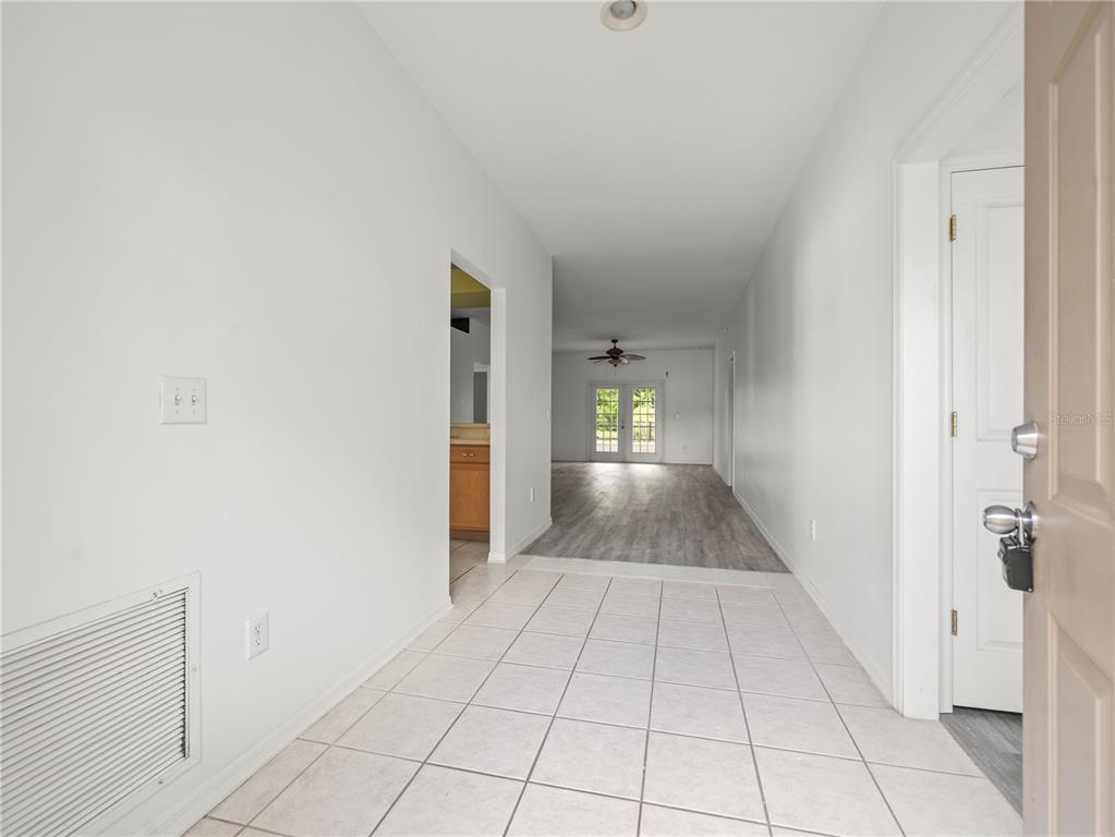 30638 Nickerson Loop Wesley Chapel, FL 33543 - Photo 8 of 39 a view of entryway with hallway