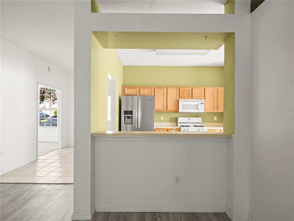 30638 Nickerson Loop Wesley Chapel, FL 33543 - Photo 9 of 39 a view of a kitchen with a window