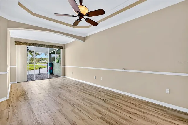 a bathroom with a sink double vanity granite tub and a mirror