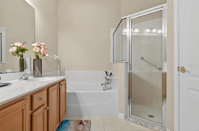a bathroom with a sink double vanity and a mirror