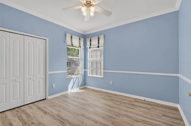 a bathroom with a sink a toilet and shower curtain