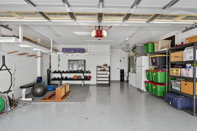 a picture of a bathroom with a refrigerator