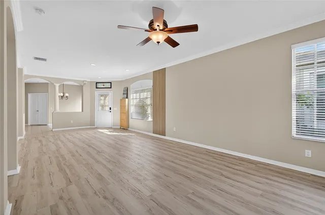 a kitchen with stainless steel appliances granite countertop a stove sink and cabinets