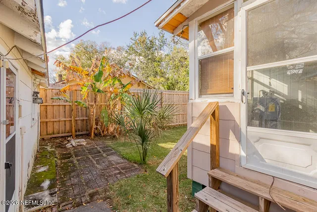 a view of a garden with an outdoor space