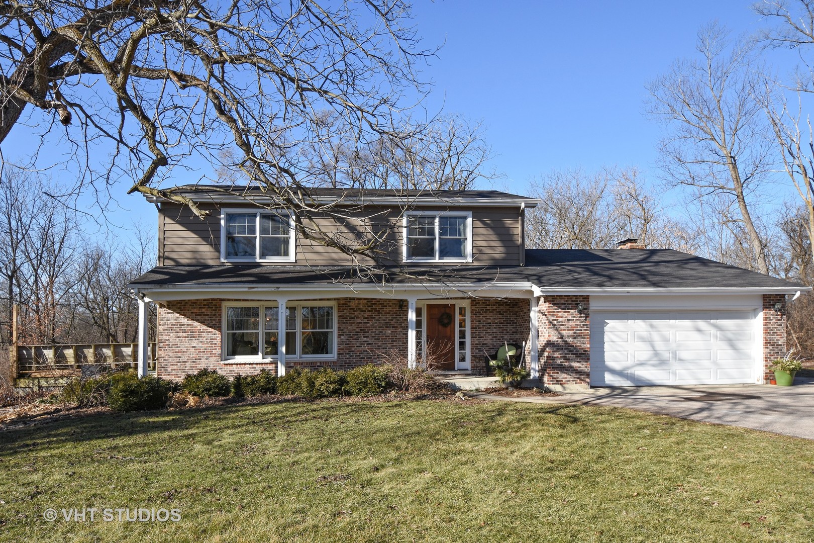176 Old Sutton Road Barrington Hills, IL 60010 - Photo 1 of 27 front view of a house with a yard