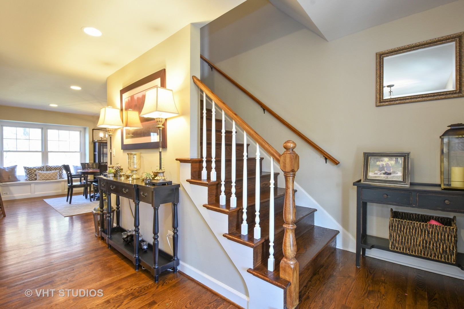176 Old Sutton Road Barrington Hills, IL 60010 - Photo 11 of 27 a view of a livingroom with furniture hardwood floor and staircase