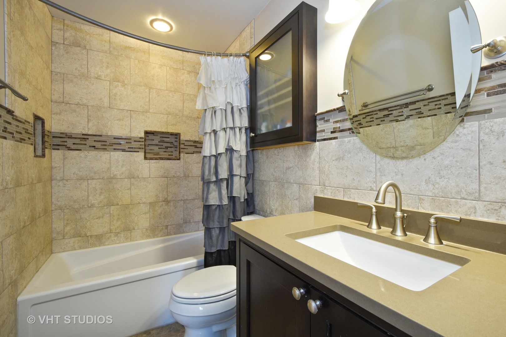 176 Old Sutton Road Barrington Hills, IL 60010 - Photo 17 of 27 a bathroom with a sink a toilet and shower