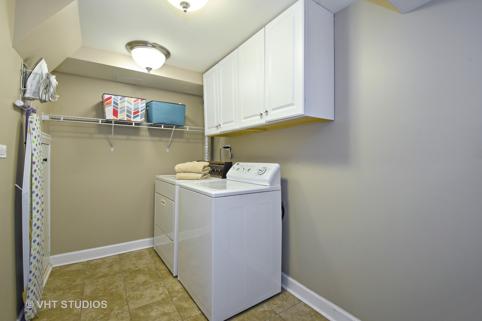 176 Old Sutton Road Barrington Hills, IL 60010 - Photo 20 of 27 a utility room with a sink washer and dryer