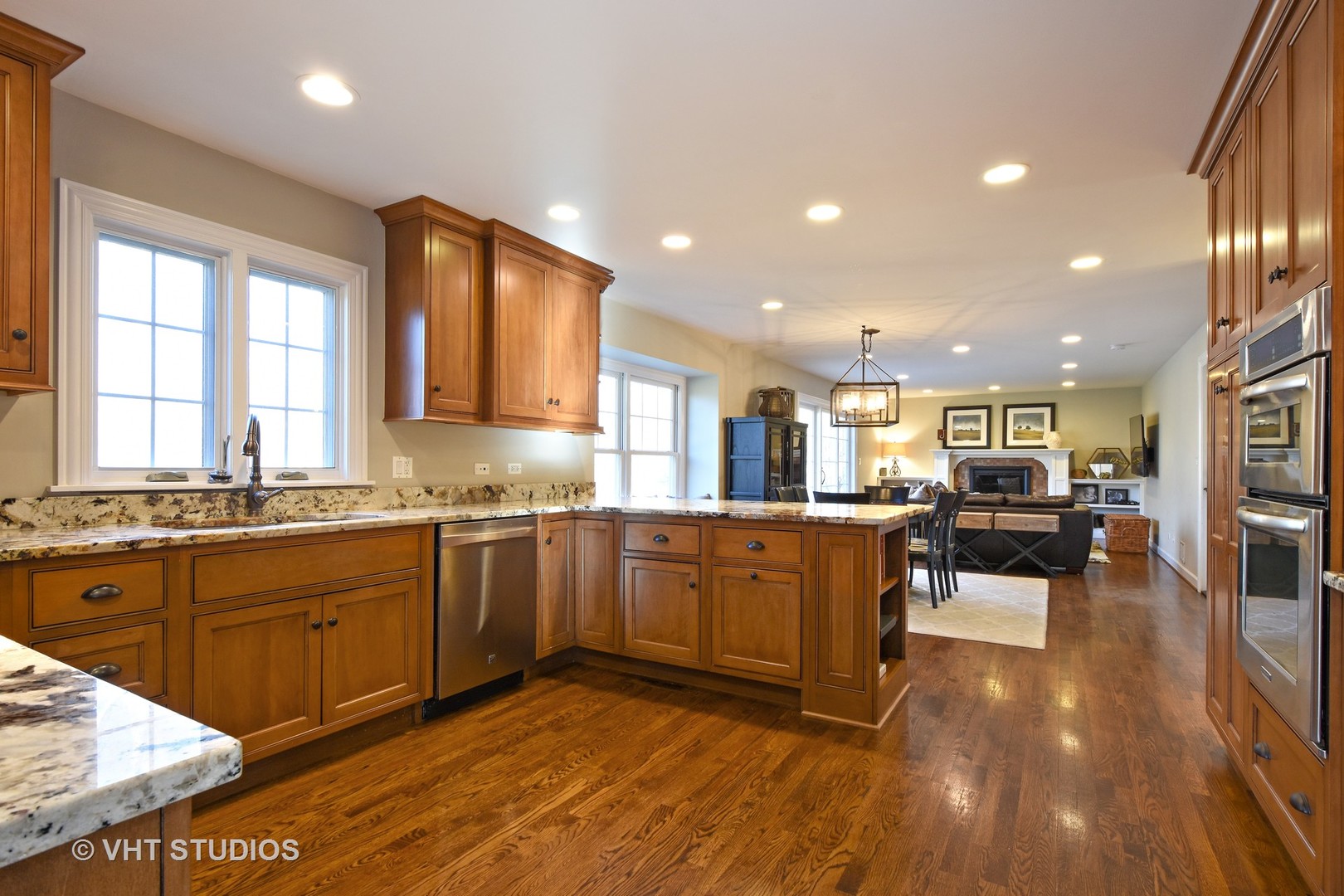 176 Old Sutton Road Barrington Hills, IL 60010 - Photo 3 of 27 a kitchen with sink cabinets and wooden floor
