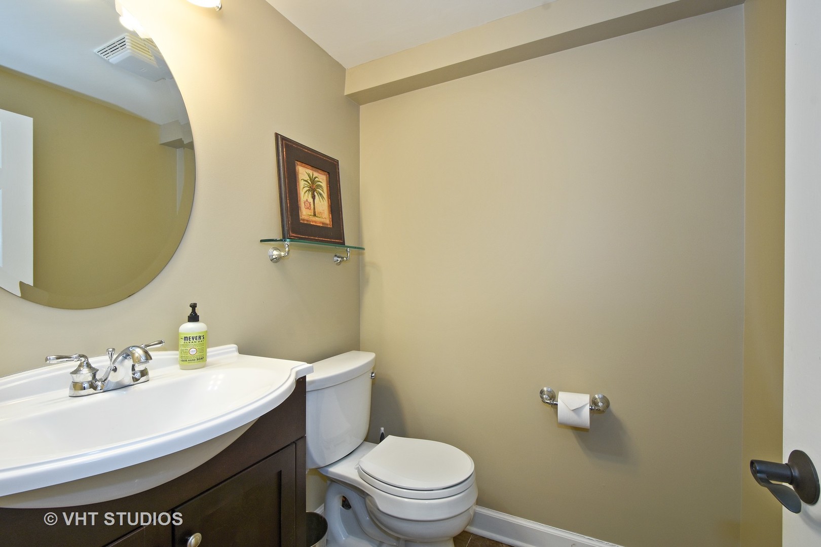 176 Old Sutton Road Barrington Hills, IL 60010 - Photo 21 of 27 a bathroom with a sink a toilet and a mirror