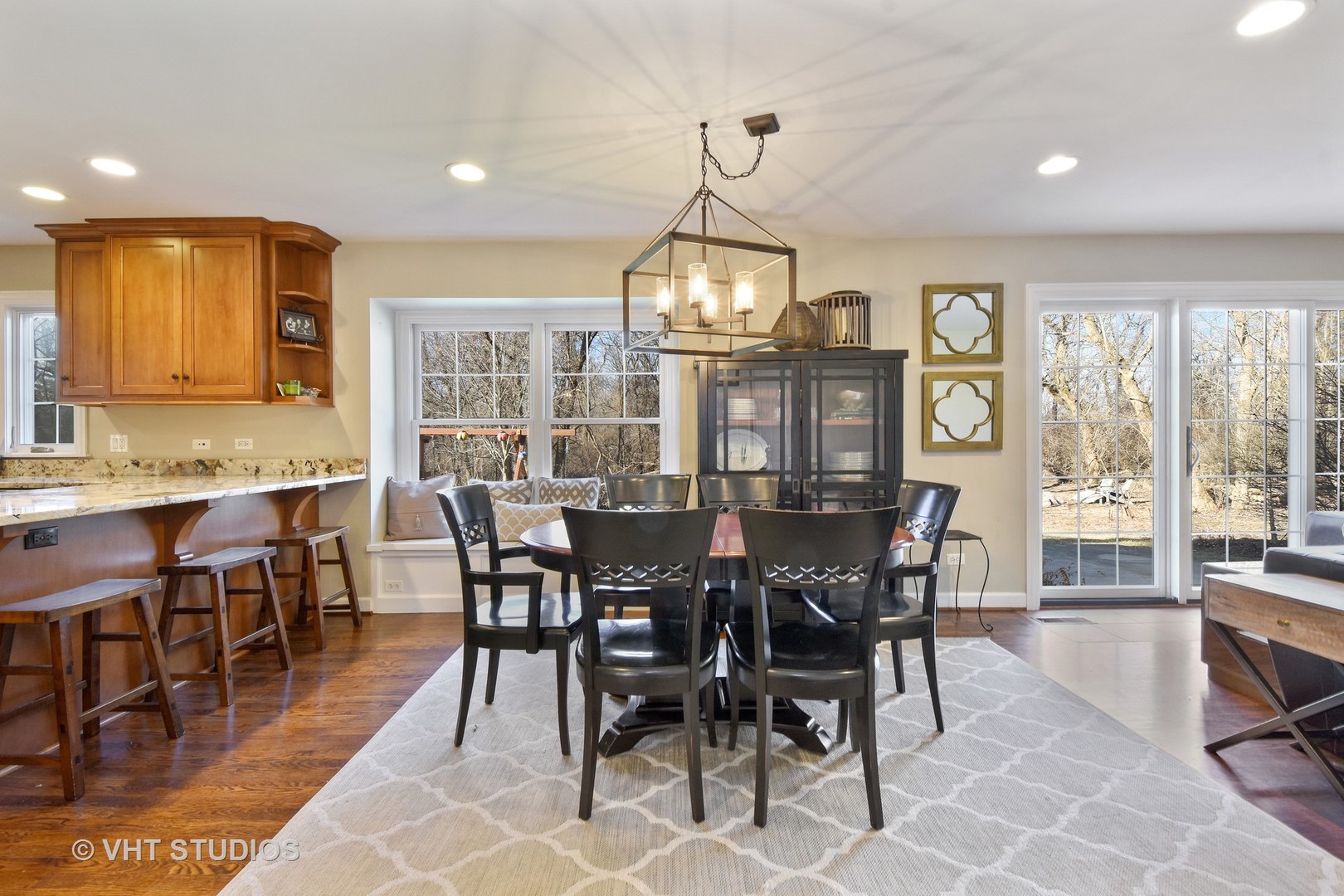 176 Old Sutton Road Barrington Hills, IL 60010 - Photo 4 of 27 a view of a dining room with furniture window and outside view