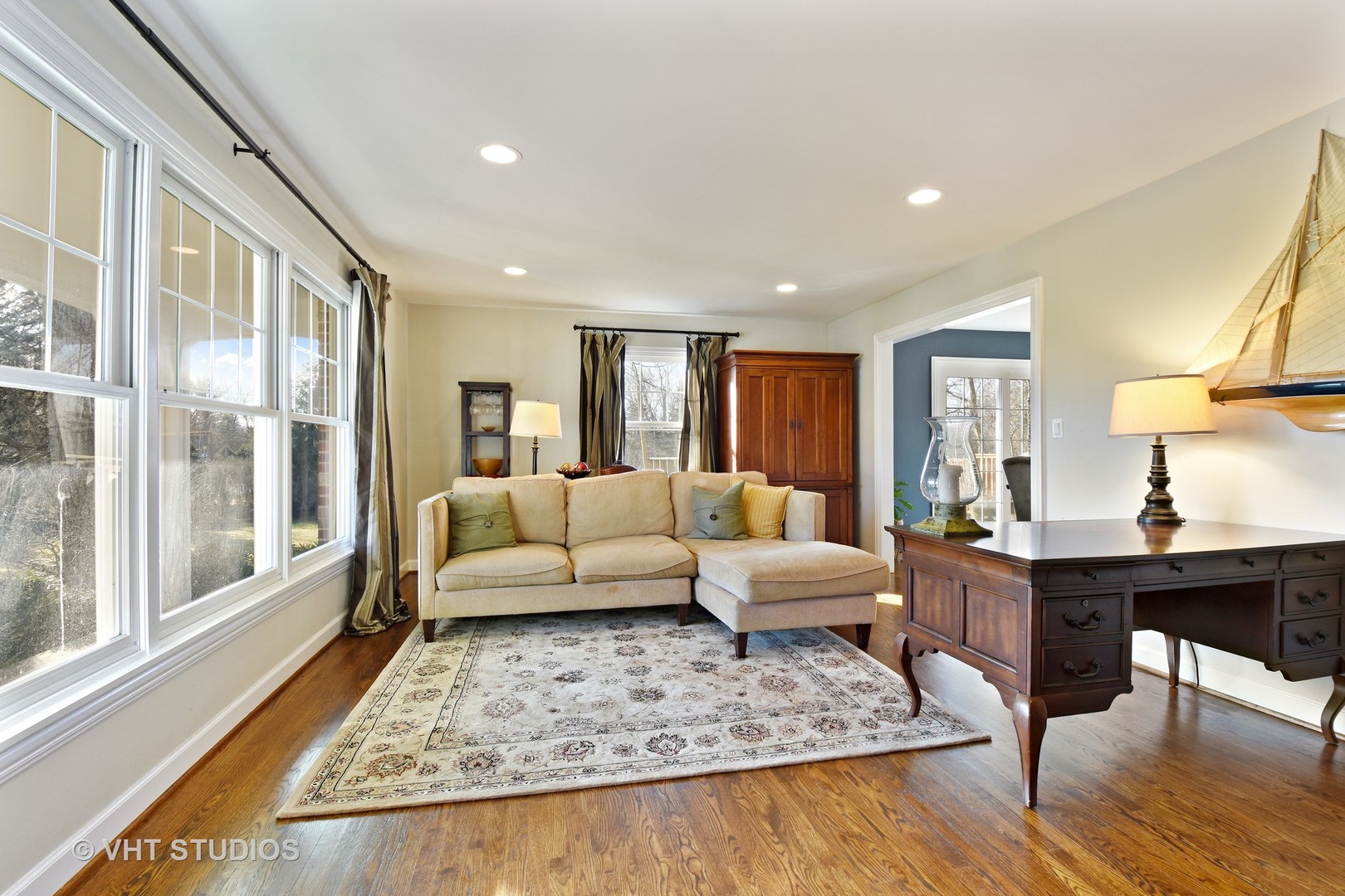 176 Old Sutton Road Barrington Hills, IL 60010 - Photo 7 of 27 a living room with furniture and a rug