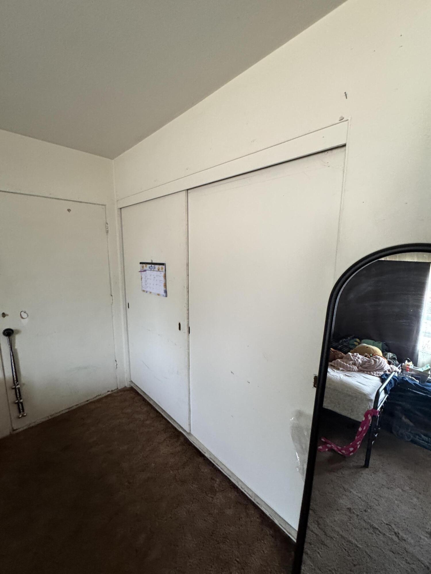 704 North Floral Street Visalia, CA 93291 - Photo 24 of 51 a view of a bedroom with a hardwood and hallway