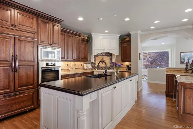 a view of a dining room with furniture and a window