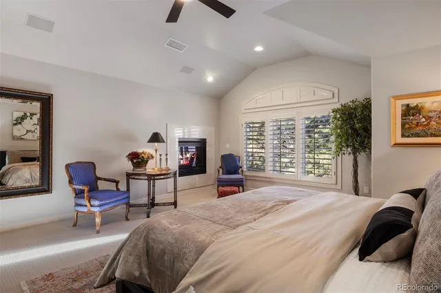 a bathroom with a granite countertop sink double and mirror