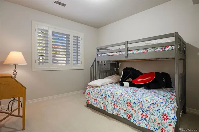 a room with furniture and gym equipment