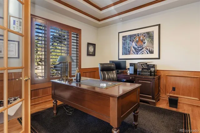 a view of a workspace with furniture