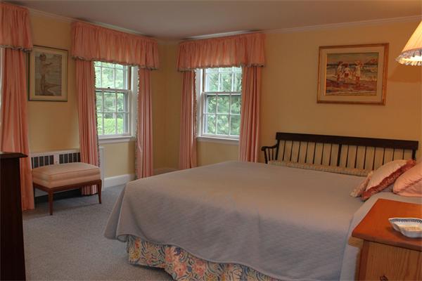 6 Wampatuck Road Dedham, MA 02026 - Photo 18 of 30 a bedroom with a bed and windows