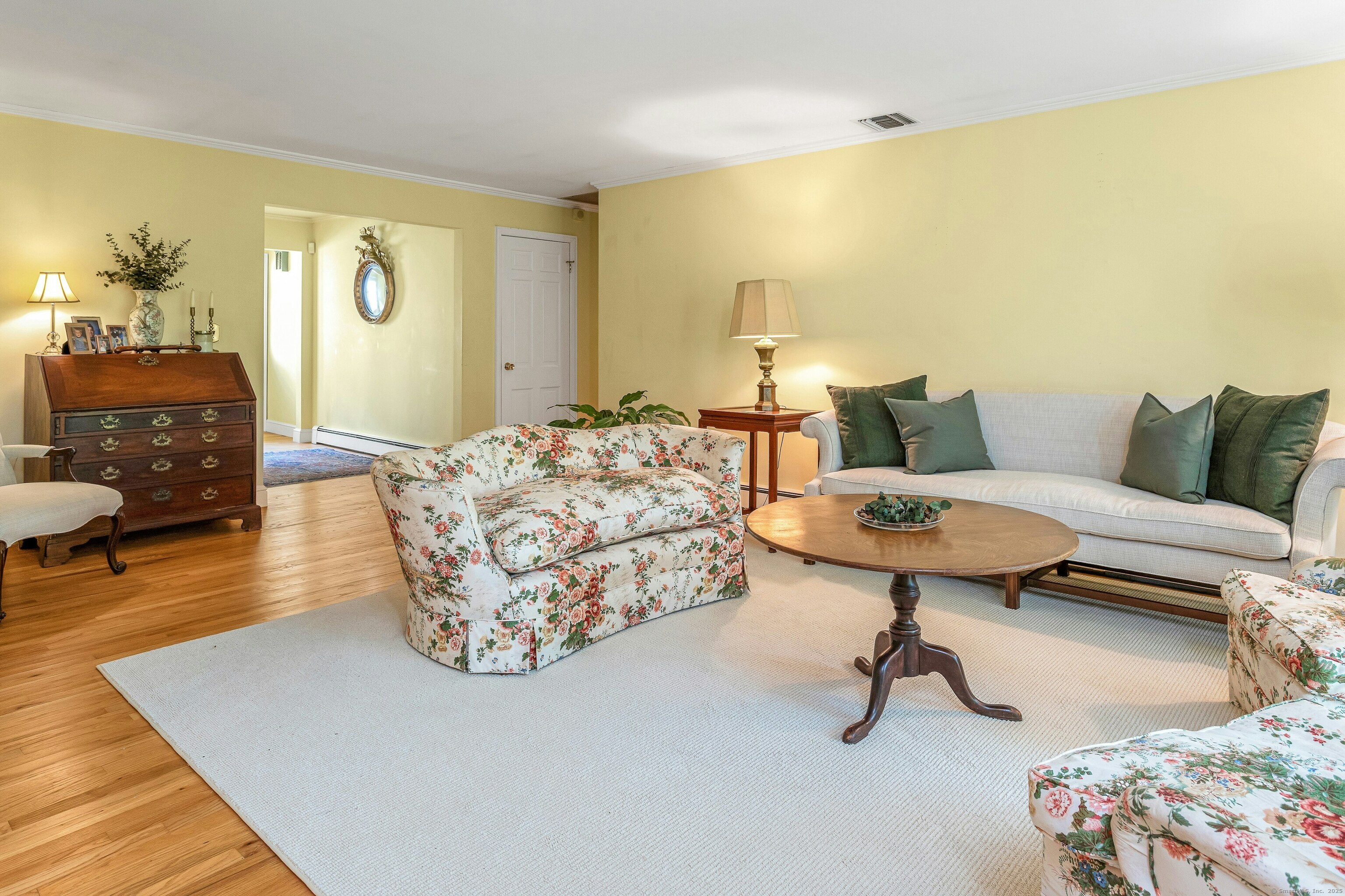 261 Linden Tree Road Wilton, CT 06897 - Photo 15 of 27 a living room with furniture and a couch