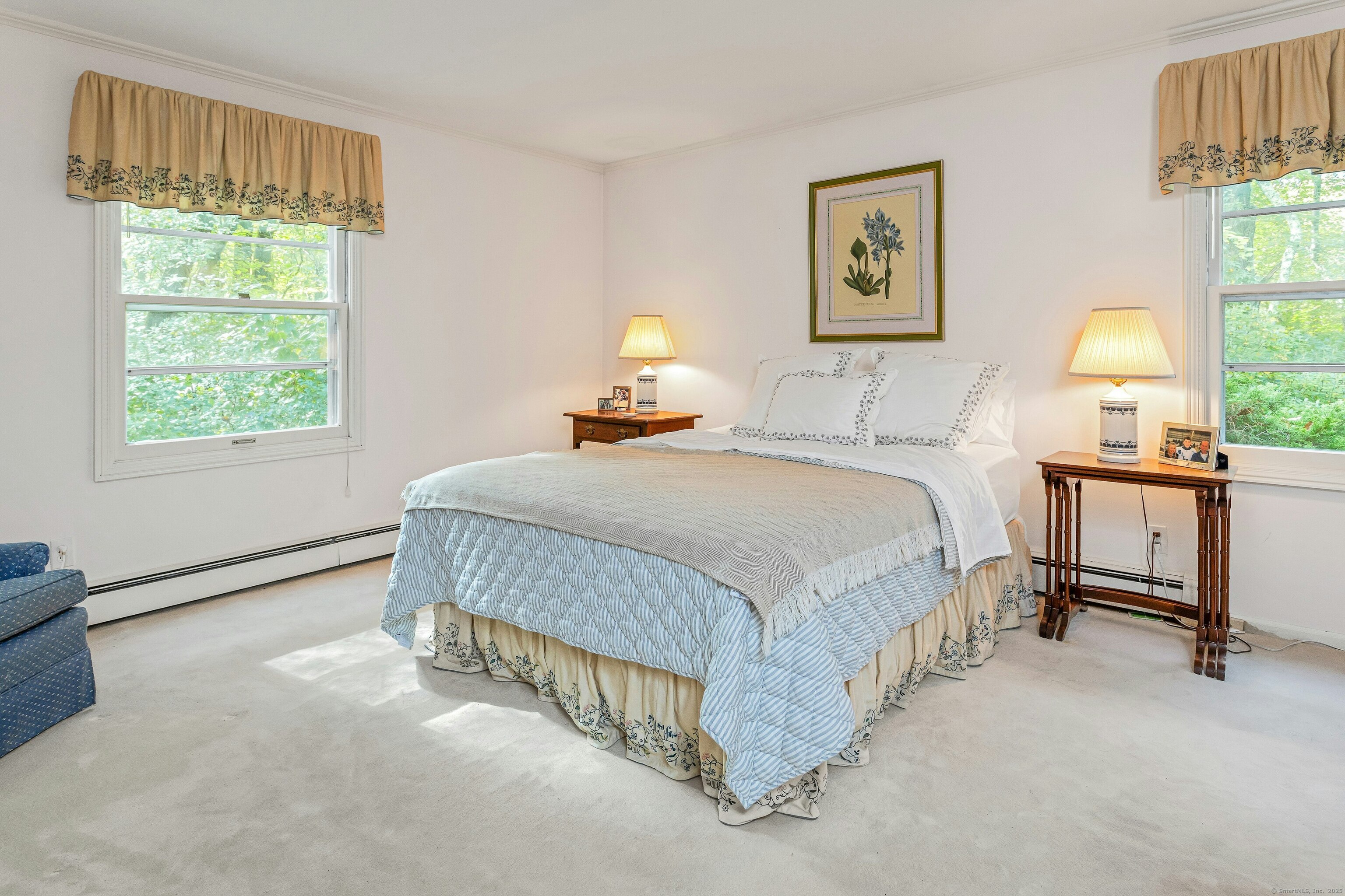 261 Linden Tree Road Wilton, CT 06897 - Photo 16 of 27 a spacious bedroom with a bed and window
