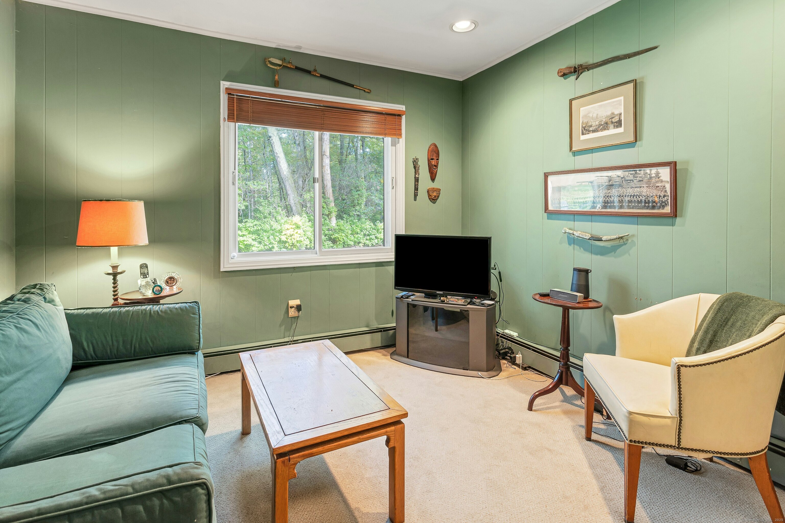 261 Linden Tree Road Wilton, CT 06897 - Photo 21 of 27 a living room with furniture and a flat screen tv