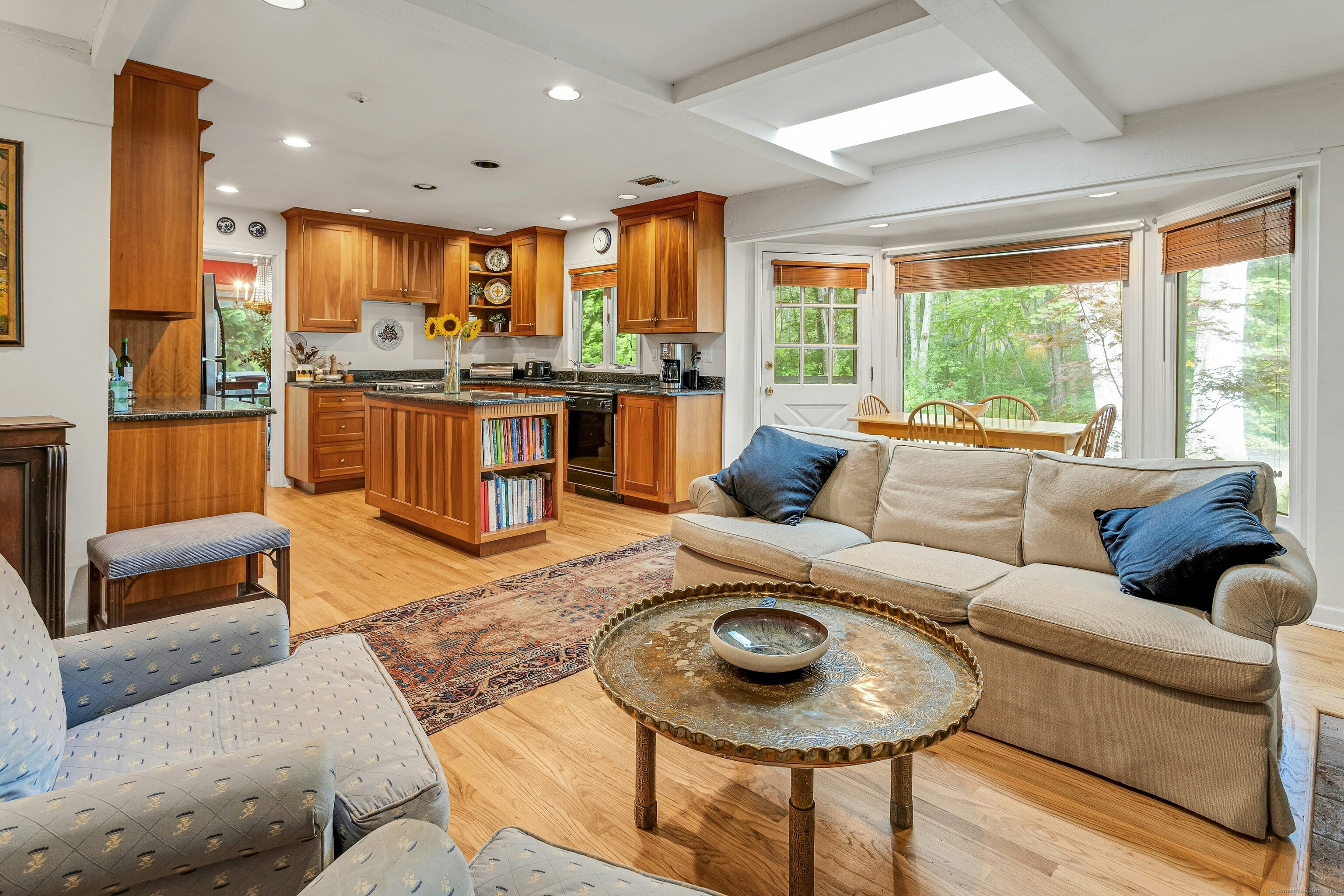 261 Linden Tree Road Wilton, CT 06897 - Photo 7 of 27 a living room with furniture and a large window