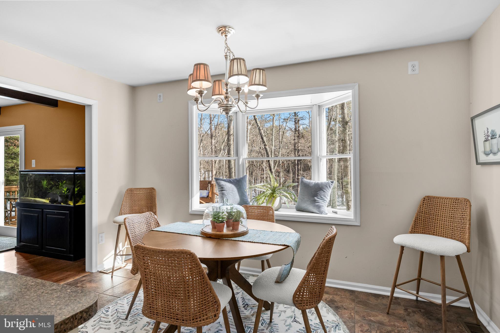 10 Lexington Court Shamong, NJ 08088 - Photo 12 of 47 a view of a dining room with furniture window and outside view