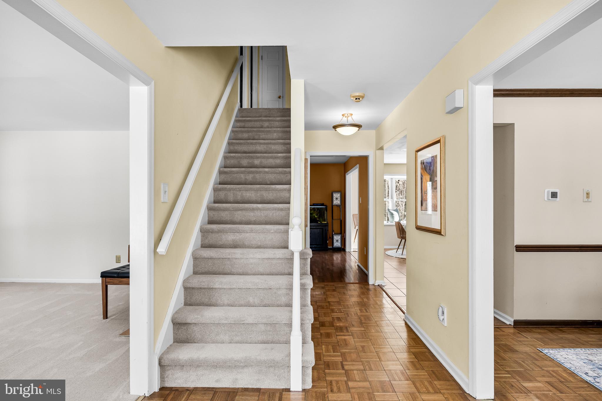 10 Lexington Court Shamong, NJ 08088 - Photo 17 of 47 a view of an entryway with wooden floor and staircase