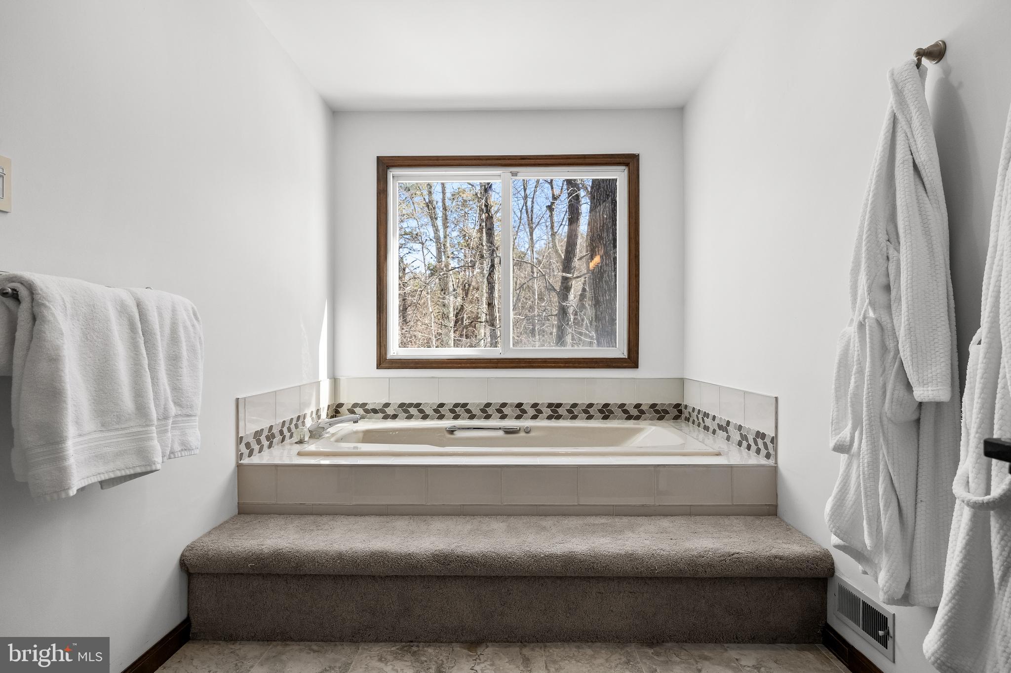 10 Lexington Court Shamong, NJ 08088 - Photo 21 of 47 a bathroom with a bathtub and window