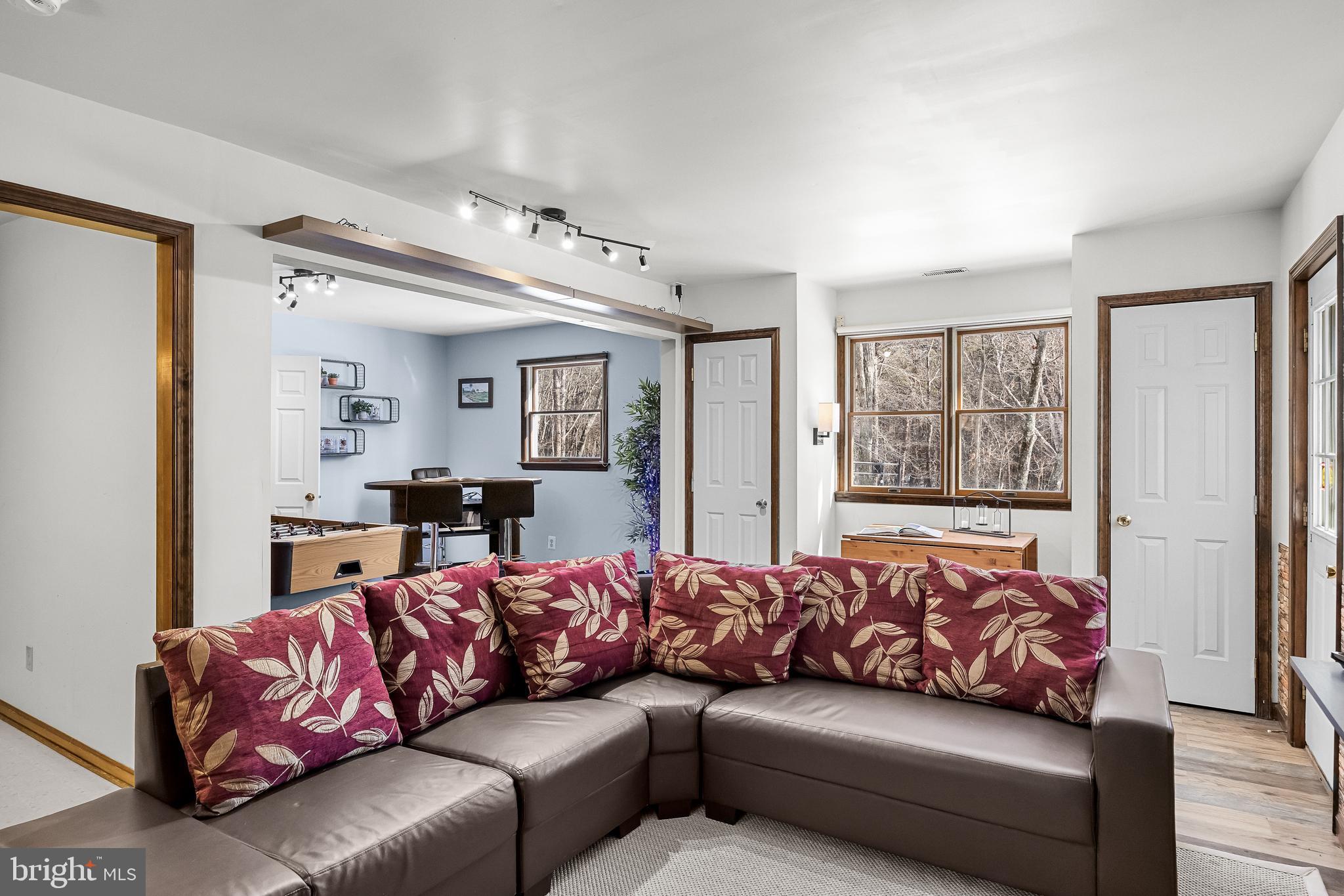 10 Lexington Court Shamong, NJ 08088 - Photo 28 of 47 a living room with furniture and a large window