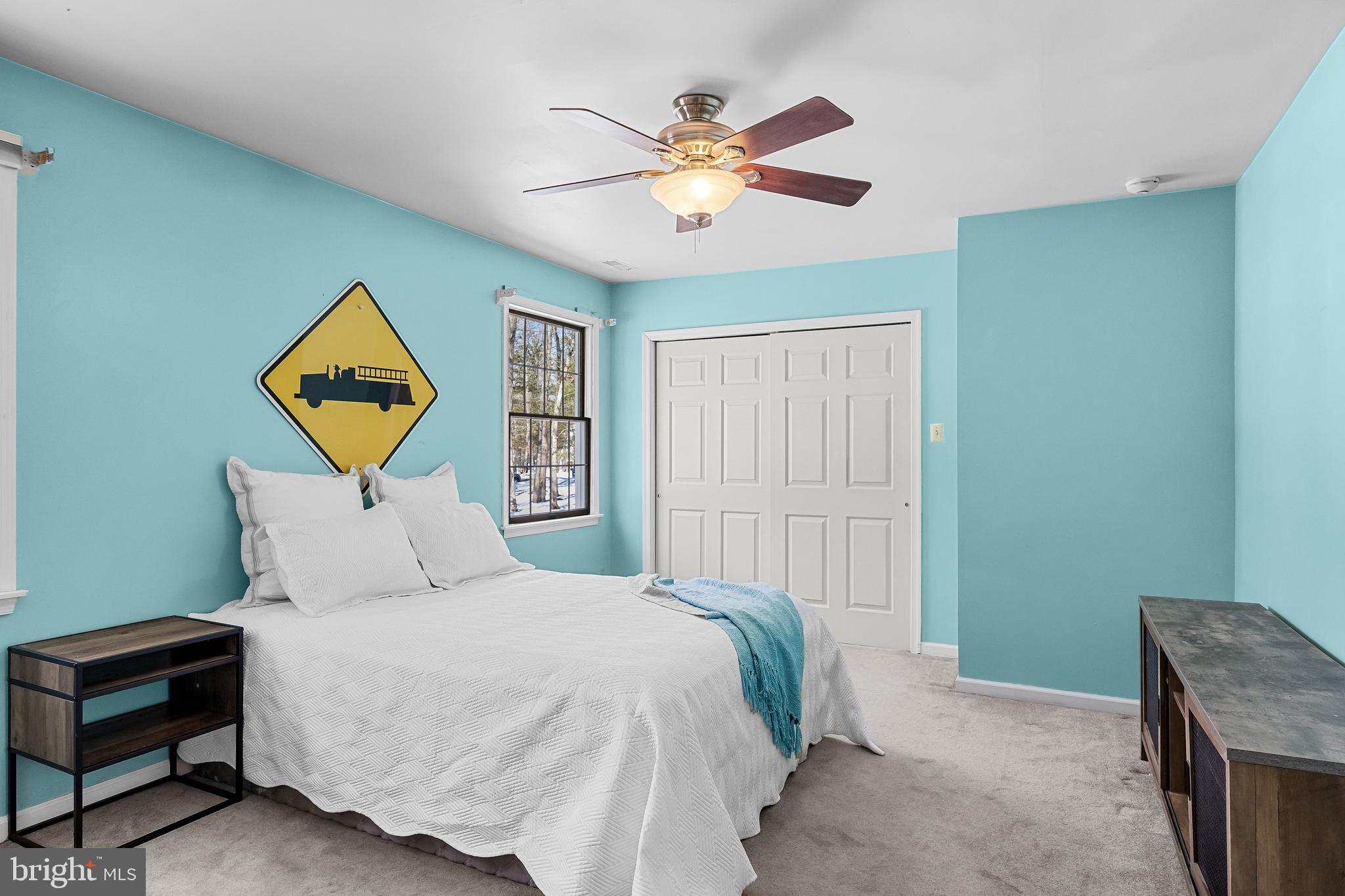 10 Lexington Court Shamong, NJ 08088 - Photo 32 of 47 a bedroom with a bed and a chandelier