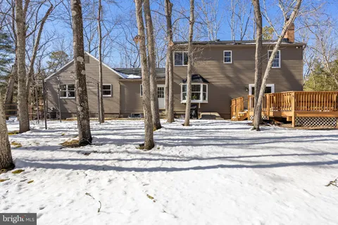 a view of street with small house