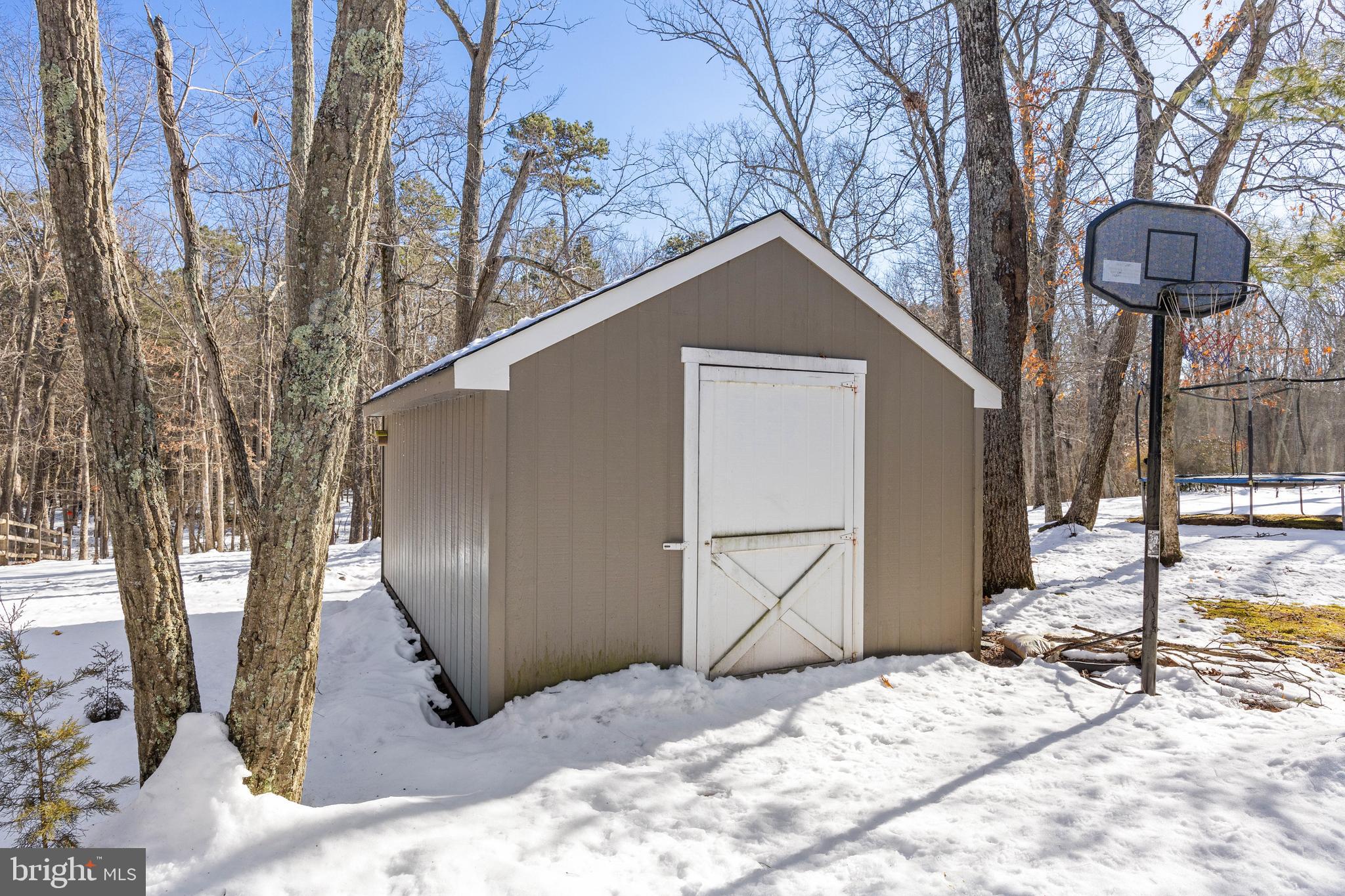 10 Lexington Court Shamong, NJ 08088 - Photo 40 of 47 a view of a house with a snow in the yard