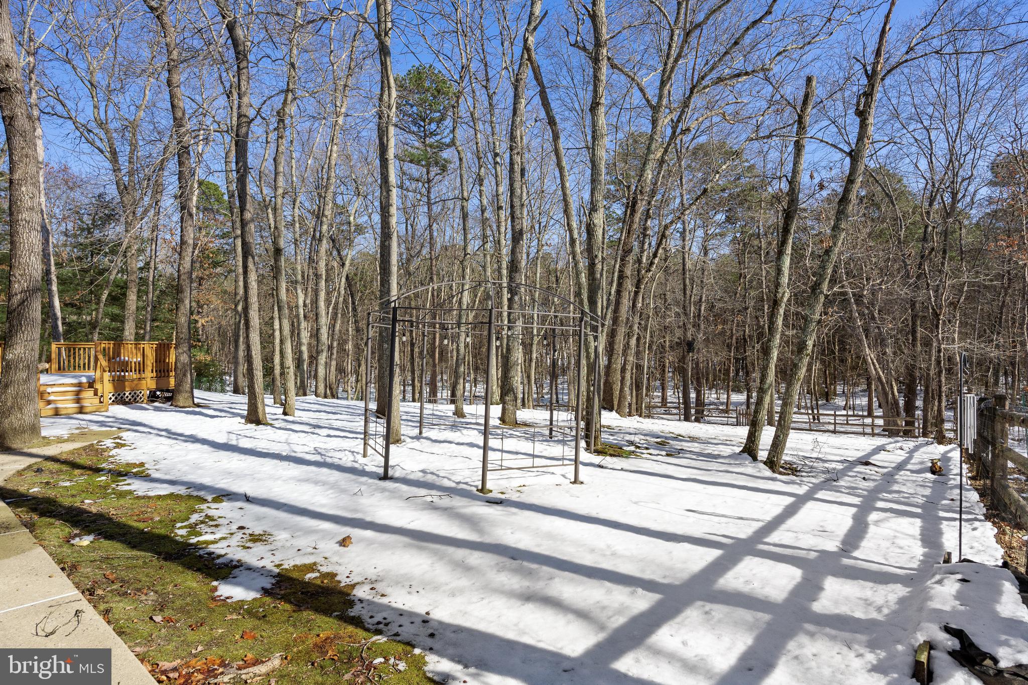 10 Lexington Court Shamong, NJ 08088 - Photo 41 of 47 a view of a park with swings and slides