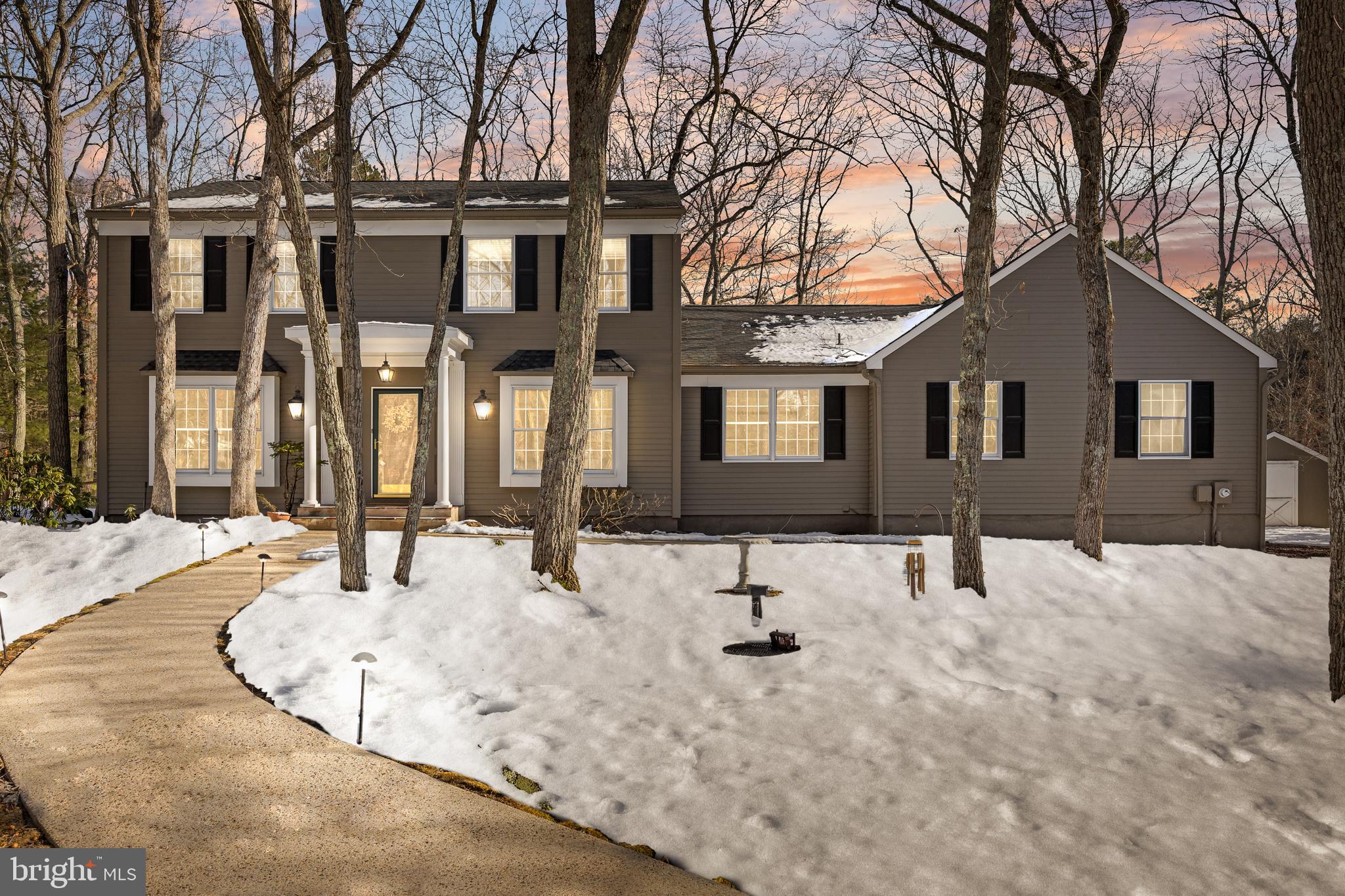 10 Lexington Court Shamong, NJ 08088 - Photo 42 of 47 a view of a house with snow on the road