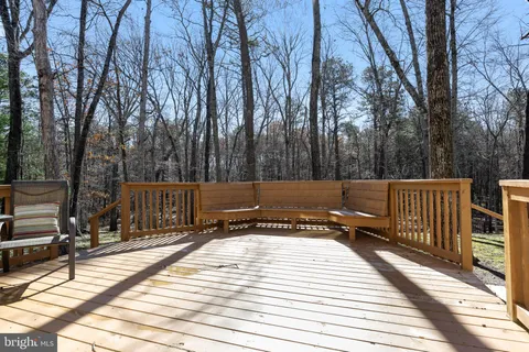 a view of swimming pool with a backyard