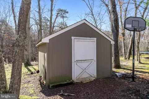 a view of swimming pool with a yard