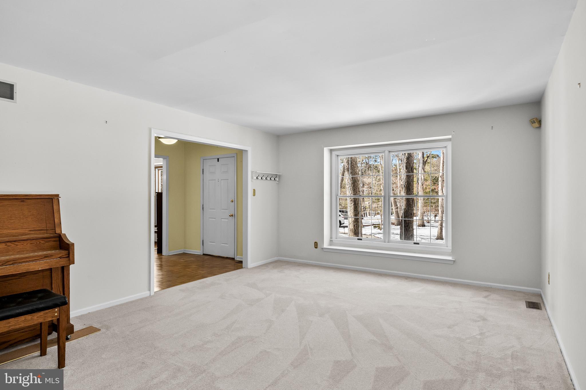 10 Lexington Court Shamong, NJ 08088 - Photo 6 of 47 an empty room with windows and closet