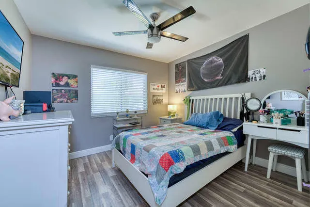 a bathroom with a toilet sink and shower